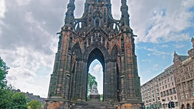 Tourists visiting Scott Monument in Edinburgh, Scotland. Spirelike Victorian memorial in honour of the writer Sir Walter Scott, with 287 steps to the top.
