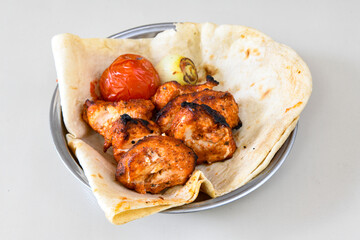 Chicken wings barbeque in a dish with BBQ grill sauce . Izgara tavuk kelebek sis kanat. Tavuk sis, gogus.