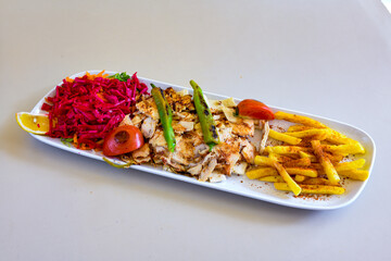 Chicken wings barbeque in a dish with BBQ grill sauce . Izgara tavuk kelebek sis kanat. Tavuk sis, gogus.