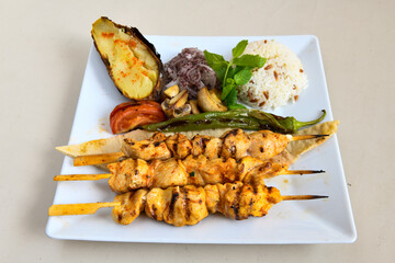 Chicken wings barbeque in a dish with BBQ grill sauce . Izgara tavuk kelebek sis kanat. Tavuk sis, gogus.