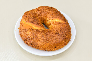 Turkish pastry product , tasty pogaca. Simit, gevrek. Turkish Pastries; peynirli, patatesli, kasarli pogaca, borek, acma, ay coregi at patisserie showcase. Citir simit.