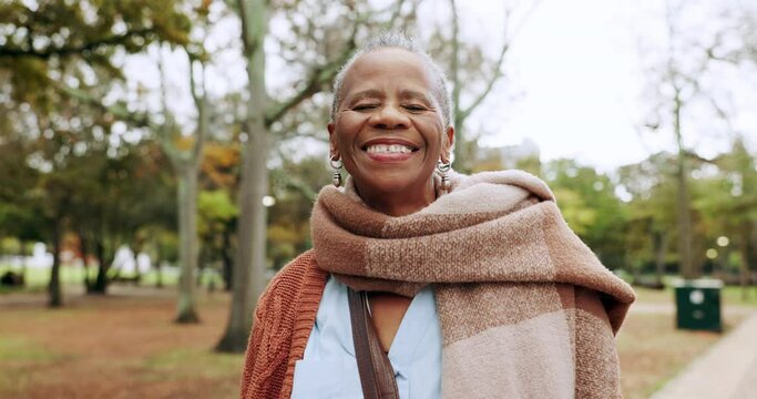 Park, nature and face of senior black woman for freedom, relaxing and smile for happy mindset. Retirement, garden and portrait of elderly female person outdoors for fresh air, wellness and health