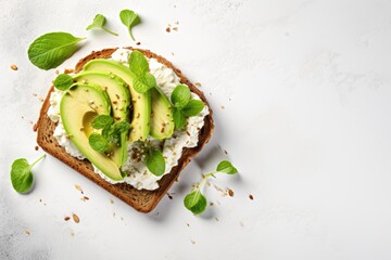 Healthy avocado open sandwich on white stone table