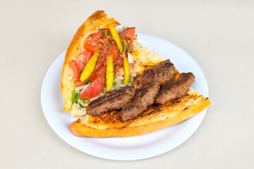 Meatball between bread (Turkish name : ekmek arasi kofte ). Izgara kofte