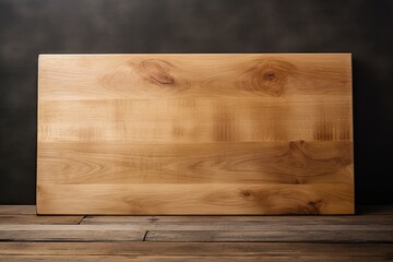 Minimalistic limbo background with new wooden cutting board on top of rectangular wooden table