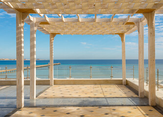 panorama of Sahl Hasheesh in Egypt for summer background with sea, beach, sun and palm trees