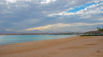 panorama of Sahl Hasheesh in Egypt for summer background with sea, beach, sun and palm trees