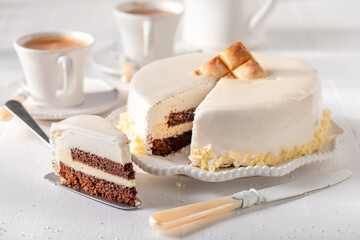 Delicious white chocolate cake made white chocolate and brownie.