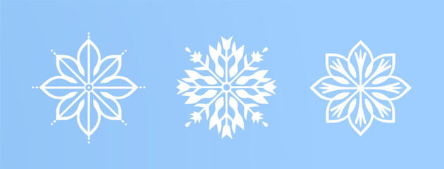 Snowflakes silhouettes on a blue background