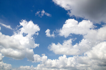 Beautiful blue sky background with natural white clouds.