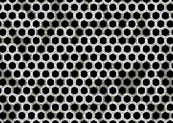 Image with hexagonal black background. Double abstract cell border with color dots and shapes and irregular hollow shapes. Black interior on pattern of hexagons sewn by shapes.