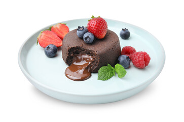 Plate with delicious chocolate fondant, berries and mint isolated on white