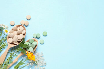 Different pills, herbs and flowers on light blue background, flat lay with space for text. Dietary supplements - obrazy, fototapety, plakaty
