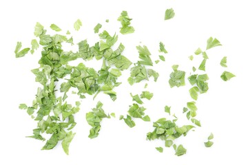 Chopped parsley leaves isolated on white, top view