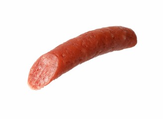 Piece of thin dry smoked sausage isolated on white