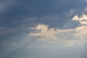 beautiful blue sky and cloud with golden ray sunrise in the morning, natural background