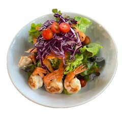 Healthy green salad with grilled shrimps and vegetables isolated on white background. Grilled prawns. Healthy food. Seafood