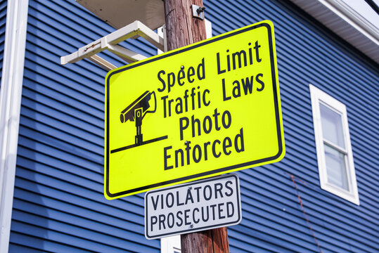 Speed limit sign on a highway, symbolizing safety and traffic control