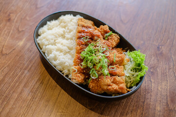 Chicken Katsu Curry is a dish of crispy chicken pieces served over rice with Japanese curry sauce.