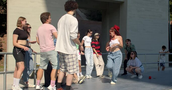 Dance master class at summer camp. Young girl shows moves. Instructor focus on different aspects of technique, choreography style and performance. 10.09.23 Folimanka, Prague, CZ