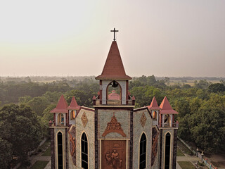 top aerial exterior view of St. Joseph Cathedral Church situated in Asia by a drone