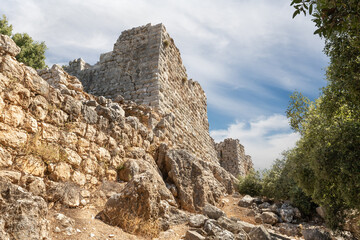 Fototapeta na wymiar Outer walls and guard towers in the medieval fortress of Nimrod - Qalaat al-Subeiba located near the border with Syria and Lebanon in the Golan Heights, in northern Israel