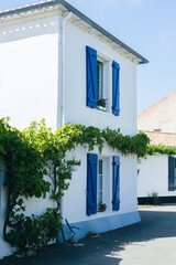 Street white houses in the center of Noirmoutier Vendee France  - obrazy, fototapety, plakaty