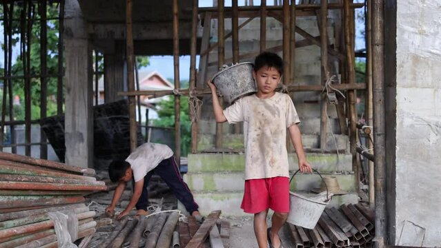 The concept of child labor, Poor children are forced to work in construction, Violence children and trafficking concept, Rights Day, World Day Against Child Labour concept