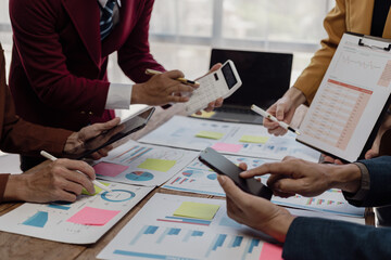 Financial consultant and accounting concept, business consulting meeting in Asia to analyze and discuss financial reporting situation in conference room. Close-up pictures