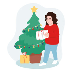 Girl with a Christmas gift. Christmas or New Year