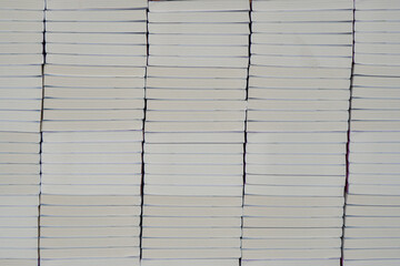 Stacks of books after going through printing production in the offset industry. Pile of books ready...