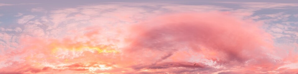 Sunset sky panorama with bright glowing pink Cirrus clouds. HDR 360 seamless spherical panorama. Full zenith or sky dome in 3D, sky replacement for aerial drone panoramas. Climate and weather change.