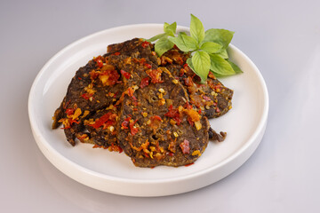 Paru Goreng Balado is Fried Lungs with Spicy Red Sauce.