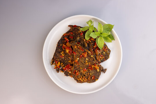 Paru Goreng Balado is Fried Lungs with Spicy Red Sauce.