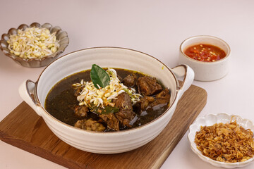Rawon is Indonesian Black Beef Soup, Utilezes the Black Keluak Nuts as the main Seasoning.