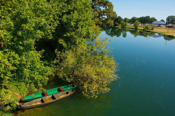 Wooden boats on the Korana River as it passes through the town of Karlovac in central Croatia