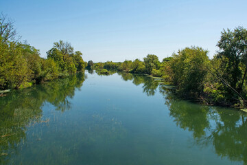 Obraz premium The Korana River as it passes through the town of Karlovac in central Croatia