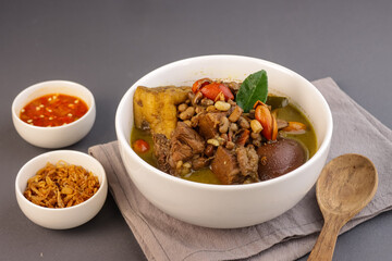 Brongkos is a Yogyakarta Spicy Meat and Bean Stew with a Special Spice, Kluwek in Coconut Milk Soup.