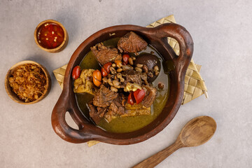 Brongkos is a Yogyakarta Spicy Meat and Bean Stew with a Special Spice, Kluwek in Coconut Milk Soup.