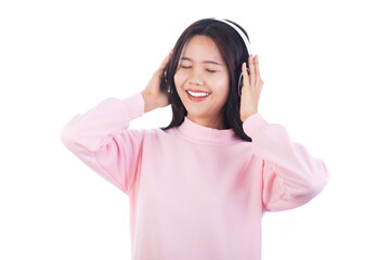 Young happy woman wear headphones listen to music with closed eyes have fun isolated on white background