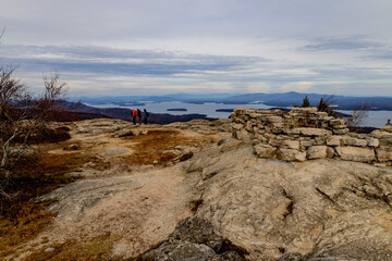 Fototapeta na wymiar Tourism on Mount Major overlooking Lake Winnipesauke in New Hampshire