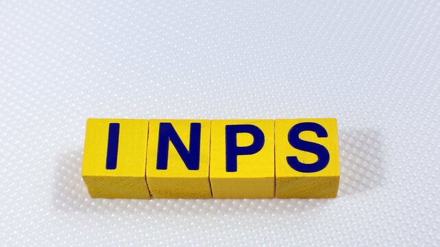 Single Word "INPS" On Wooden Block. Taxes on the concept, Italian government reform.