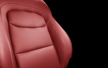 Car red leather interior. Part of red leather car seat details with white stitching. Interior of...