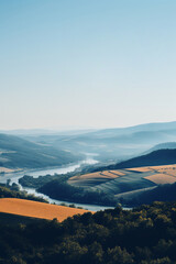 Landscape picture with river, fields, valley. Travel image with rustic and misty panorama for poster, postcard, flyer