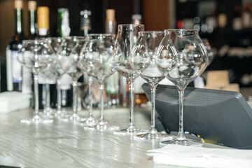 Bottles of wine. Wine glasses.  Wine cellar. Wine library.