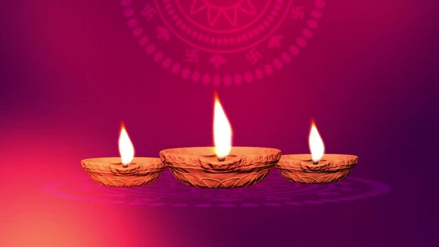 Handmade clay diya oil lamp  with cotton wicks for  Diwali pink background