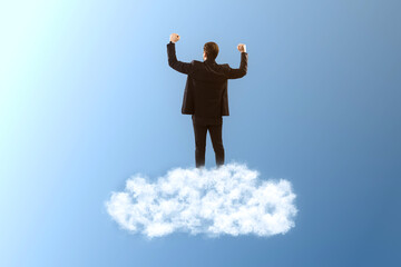 Back view of young caucasian businessman standing on cloud. Blue sky background. Dream big, business and strategy, forethought and vision concept.