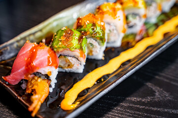 Close-up of Rainbow rolls in the Japanese restaurant. 