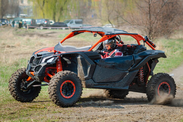 Fototapeta na wymiar ATV and UTV offroad vehicle racing in dust. Extreme, adrenalin. 4x4