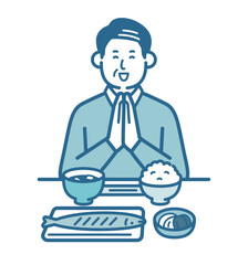 食事をとる高齢男性